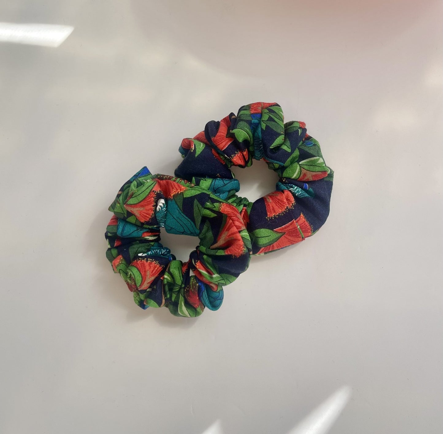 Pohutakawa and Tūī Scrunchies